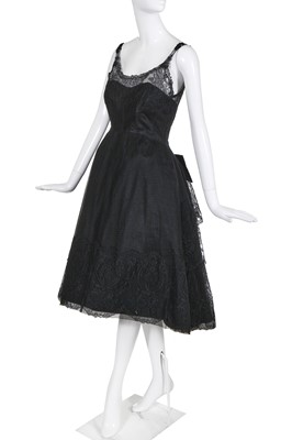 Lot 120 - A Norman Hartnell couture black lace dance dress, circa 1956