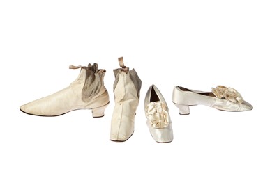 Lot 477 - A pair of ivory satin bridal shoes, circa 1880