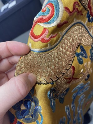 Lot 522 - An embroidered yellow satin dragon robe, Chinese for the Western market, early to mid-20th Century