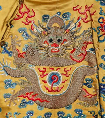 Lot 522 - An embroidered yellow satin dragon robe, Chinese for the Western market, early to mid-20th Century