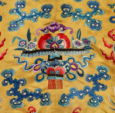 Lot 522 - An embroidered yellow satin dragon robe, Chinese for the Western market, early to mid-20th Century