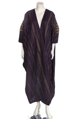 Lot 513 - A purple and gold silk Aba robe, Syrian, circa 1920