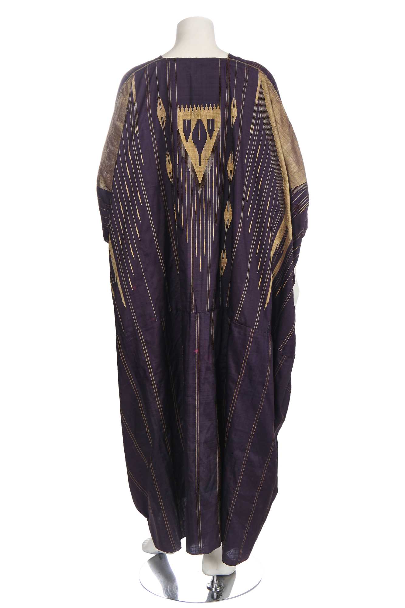 Lot 513 - A purple and gold silk Aba robe, Syrian, circa 1920