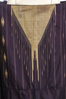 Lot 513 - A purple and gold silk Aba robe, Syrian, circa 1920