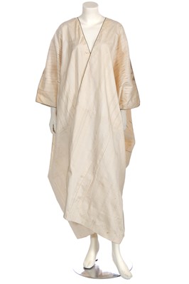 Lot 514 - An ivory and gold silk Aba robe, Syrian, circa 1920