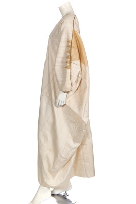 Lot 514 - An ivory and gold silk Aba robe, Syrian, circa 1920