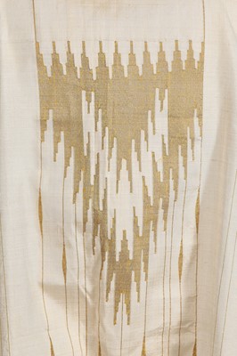 Lot 514 - An ivory and gold silk Aba robe, Syrian, circa 1920