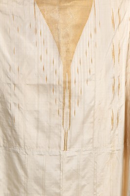 Lot 514 - An ivory and gold silk Aba robe, Syrian, circa 1920