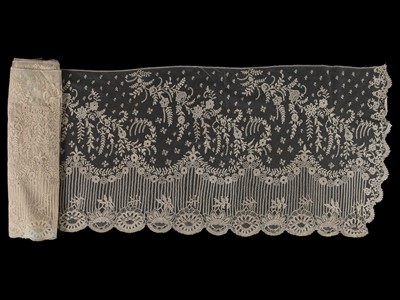 Lot 527 - A Brussels mixed lace dress flounce, circa 1880