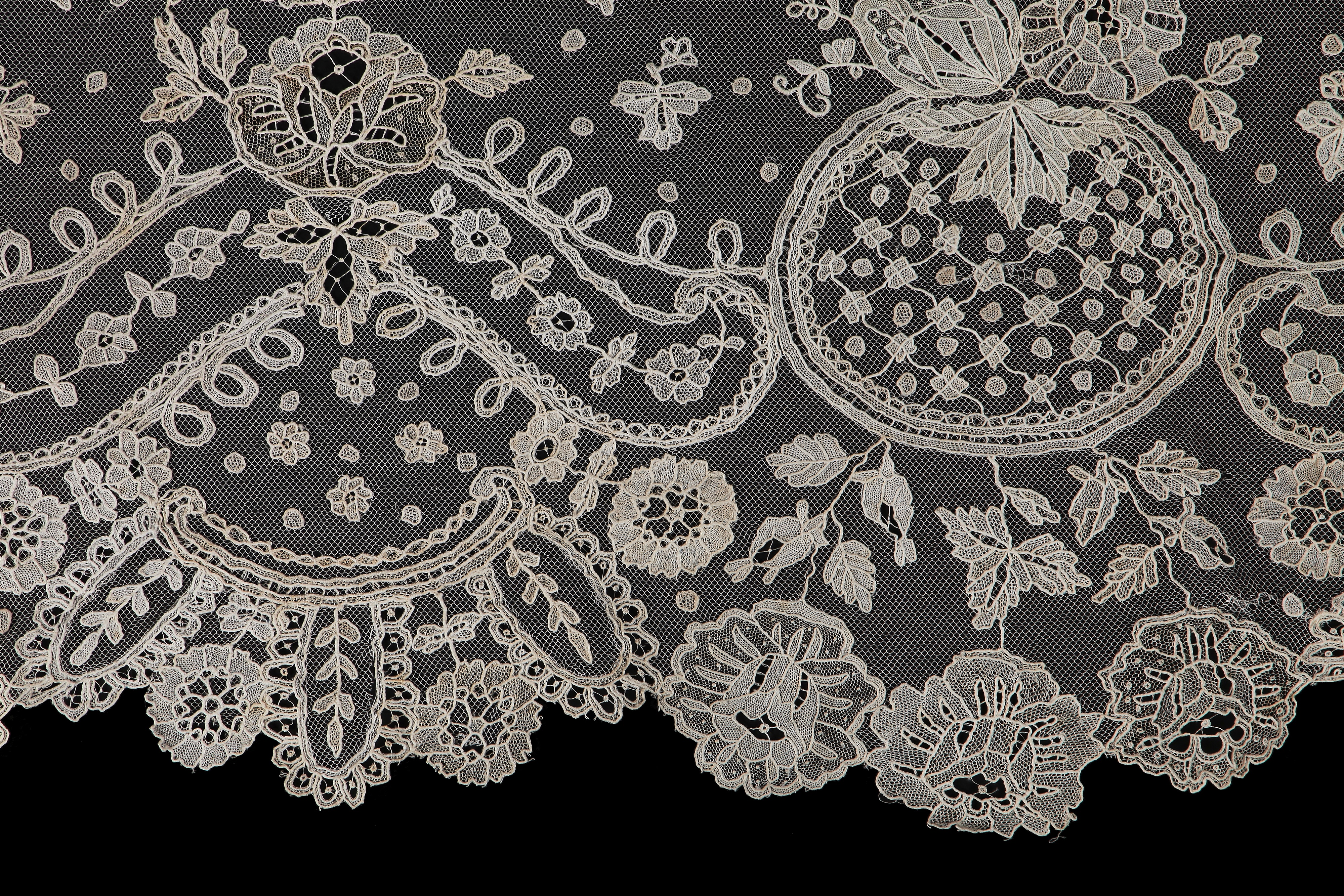 Lot 528 - Two dress flounces of Brussels needlepoint