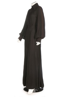 Lot 350 - An Ossie Clark black moss crepe evening gown,...