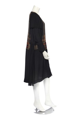 Lot 407 - A finely embroidered and pleated crêpe dress, circa 1924