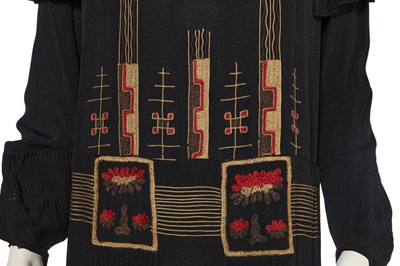 Lot 407 - A finely embroidered and pleated crêpe dress, circa 1924