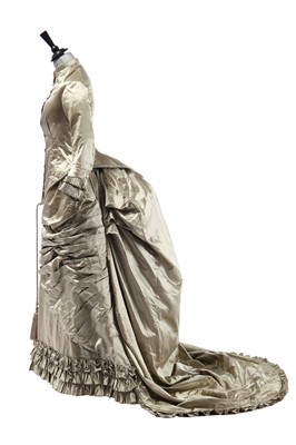 Lot 473 - A champagne-green satin bridal gown, circa 1880