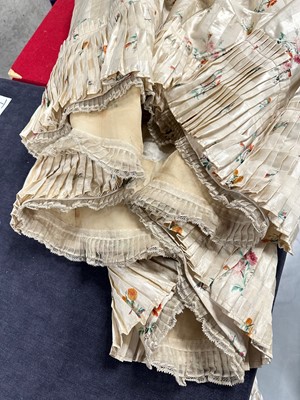 Lot 475 - A floral striped silk tea gown, late 1870s