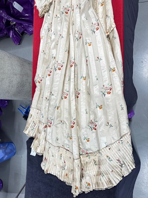 Lot 475 - A floral striped silk tea gown, late 1870s