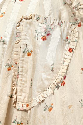 Lot 475 - A floral striped silk tea gown, late 1870s