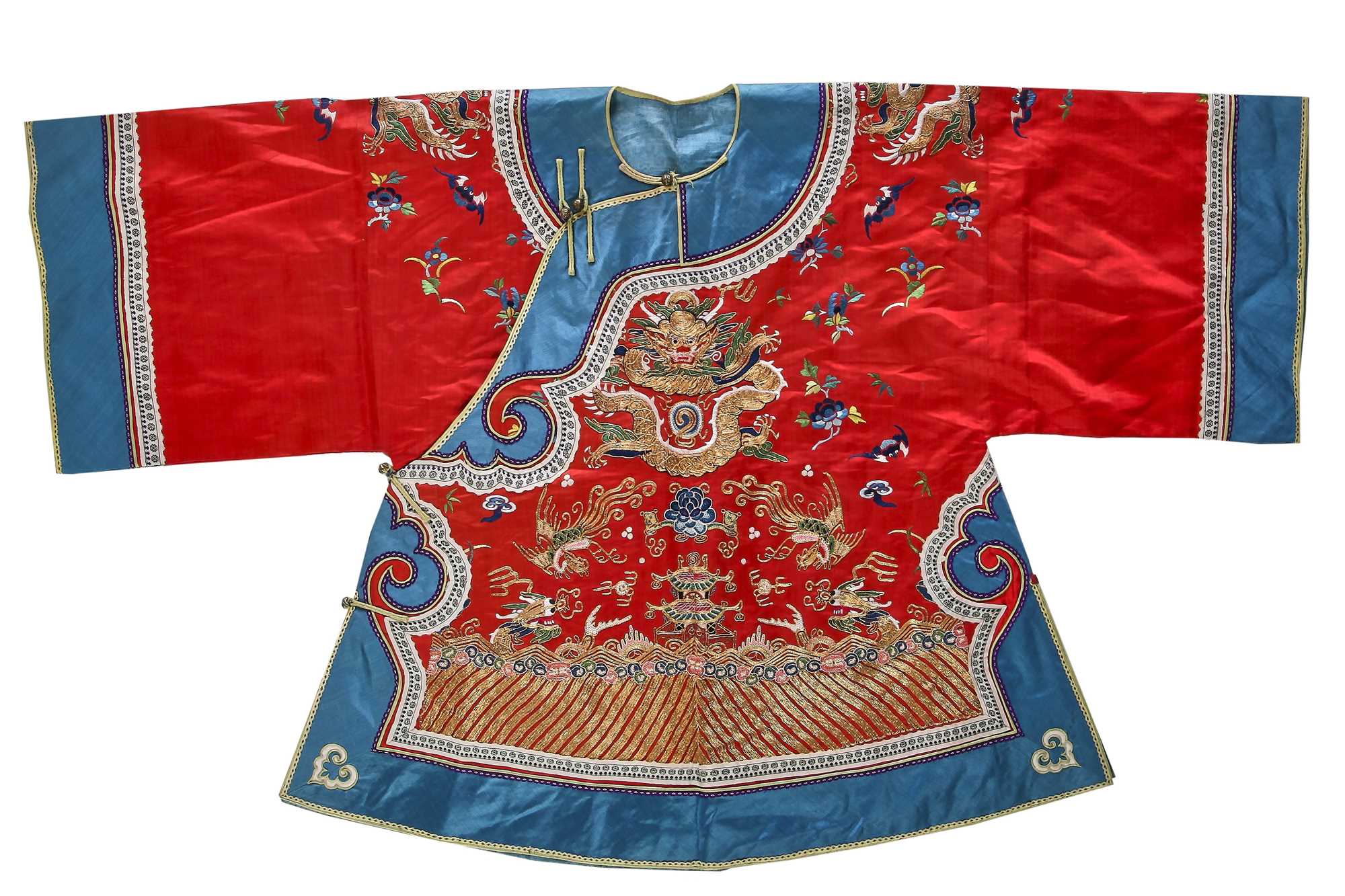 Lot 523 - A child's embroidered red satin dragon robe,