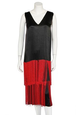 Lot 401 - A beaded black satin flapper dress, circa 1925