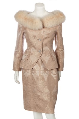 Lot 167 - A Jacques Fath nude silk-blend suit with fox fur collar, late 1980s-early 1990s