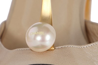 Lot 40 - A pair of Chanel pearlescent leather two-tone shoes, early 2000s