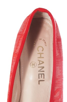 Lot 43 - A Chanel red canvas baseball cap and pair of matching ballet shoes, early 2000s