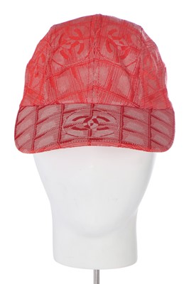 Lot 43 - A Chanel red canvas baseball cap and pair of matching ballet shoes, early 2000s