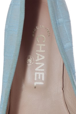 Lot 44 - A Chanel sky-blue canvas baseball cap and pair of matching ballet shoes, early 2000s