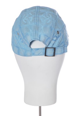 Lot 44 - A Chanel sky-blue canvas baseball cap and pair of matching ballet shoes, early 2000s