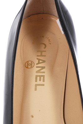 Lot 48 - Three pairs of Chanel shoes, early 2000s
