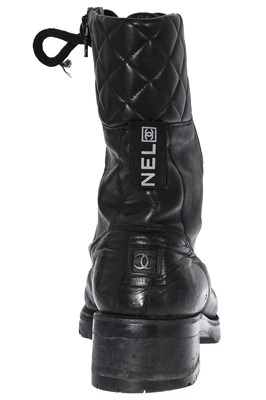 Lot 30 - A pair of Chanel black leather combat boots, early 2000s