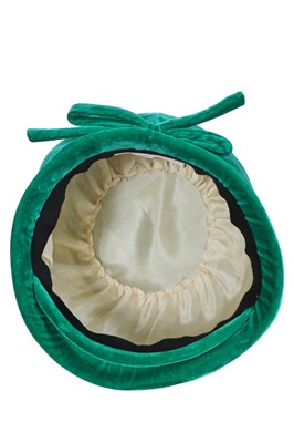Lot 355 - A Christian Dior hat in emerald-green velvet, circa 1960