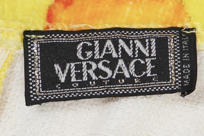 Lot 173 - A group of Versace summer clothing in bright and colourful prints, mainly 1990s