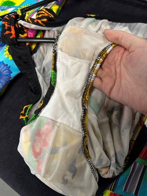 Lot 173 - A group of Versace summer clothing in bright and colourful prints, mainly 1990s