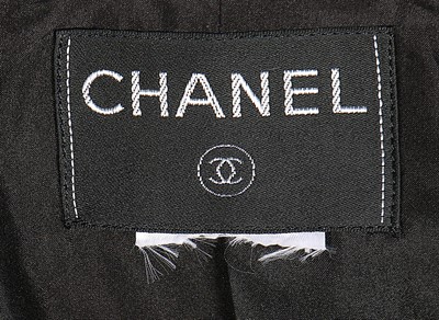 Lot 30 - A Chanel golden tweed jacket, modern, labelled,...