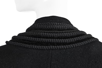 Lot 121 - A Pierre Balmain couture black wool cape, circa 1950