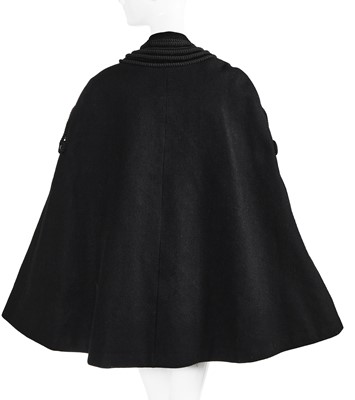 Lot 121 - A Pierre Balmain couture black wool cape, circa 1950