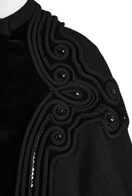 Lot 121 - A Pierre Balmain couture black wool cape, circa 1950