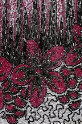 Lot 365 - A pink and black beaded tunic dress, mid 1920s,...