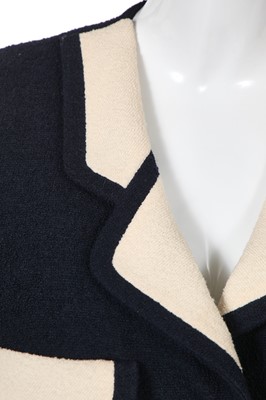 Lot 10 - A  Chanel navy and ivory bouclé wool suit, Spring-Summer 1991