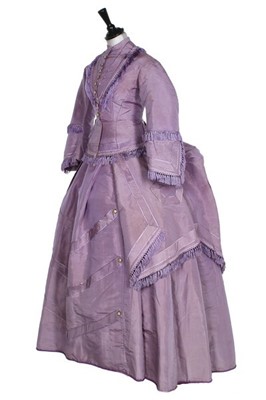 Lot 283 - A three-piece lilac silk dress, circa 1870,...