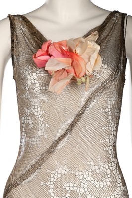 Lot 373 - A bias cut gold lace evening gown, early 1930s,...