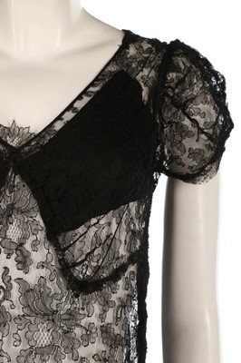 Lot 373 - A bias cut gold lace evening gown, early 1930s,...
