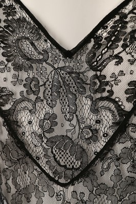 Lot 373 - A bias cut gold lace evening gown, early 1930s,...