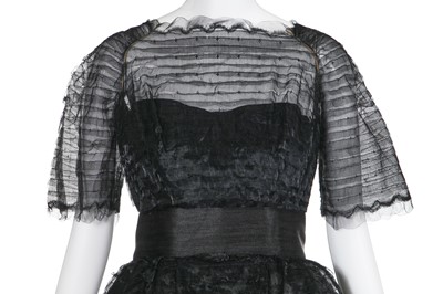 Lot 144 - A Jeanne Lanvin by Antonio Castillo couture tiered black organza cocktail dress, circa 1960