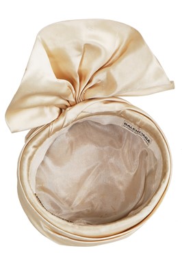 Lot 305 - A Balenciaga ivory satin 'turban' hat, 1960s