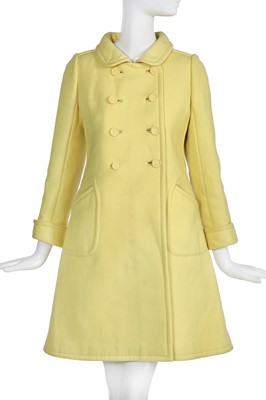 Lot 139 - An André Courrèges lemon yellow coat, circa 1967