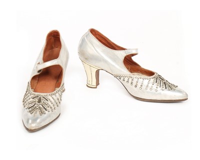 Lot 379 - A good pair of silver leather and rhinestone...