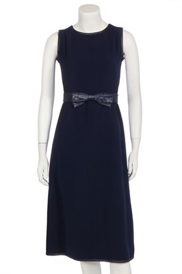 Lot 259 - An André Courrèges navy wool and vinyl dress, early 1970s