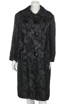 Lot 317 - A Nina Ricci haute couture black damask satin evening coat, 1950s